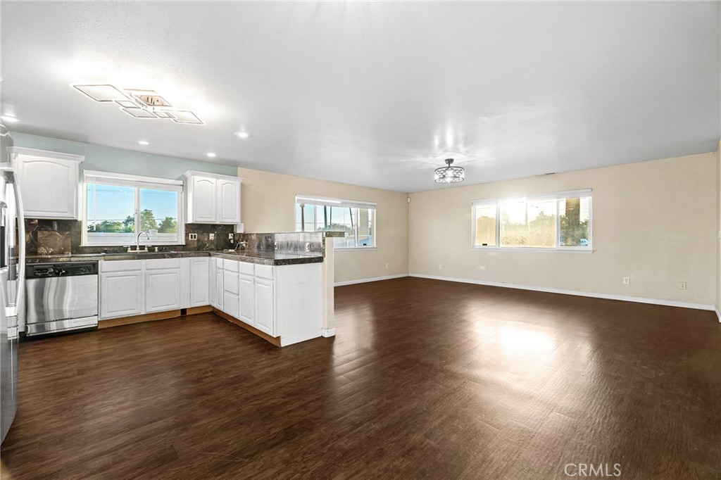 4 La Palma Drive Oroville, CA 95965 - Photo 7 of 39 a view of kitchen with cabinets and wooden floor