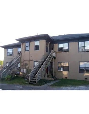 a house view with a outdoor space