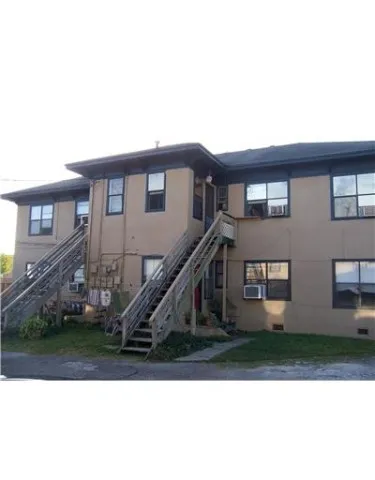 a house view with a outdoor space