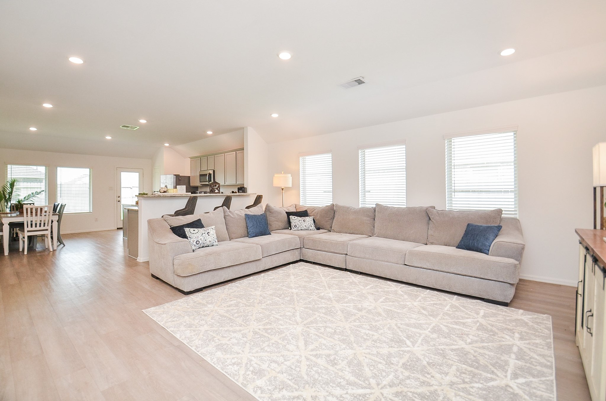 5308 Rushing Brk Lane Richmond, TX 77469 - Photo 6 of 24 Open concept living/kitchen keeps you engaged with your family & guests. Recessed lighting, light & easy to manage flooring