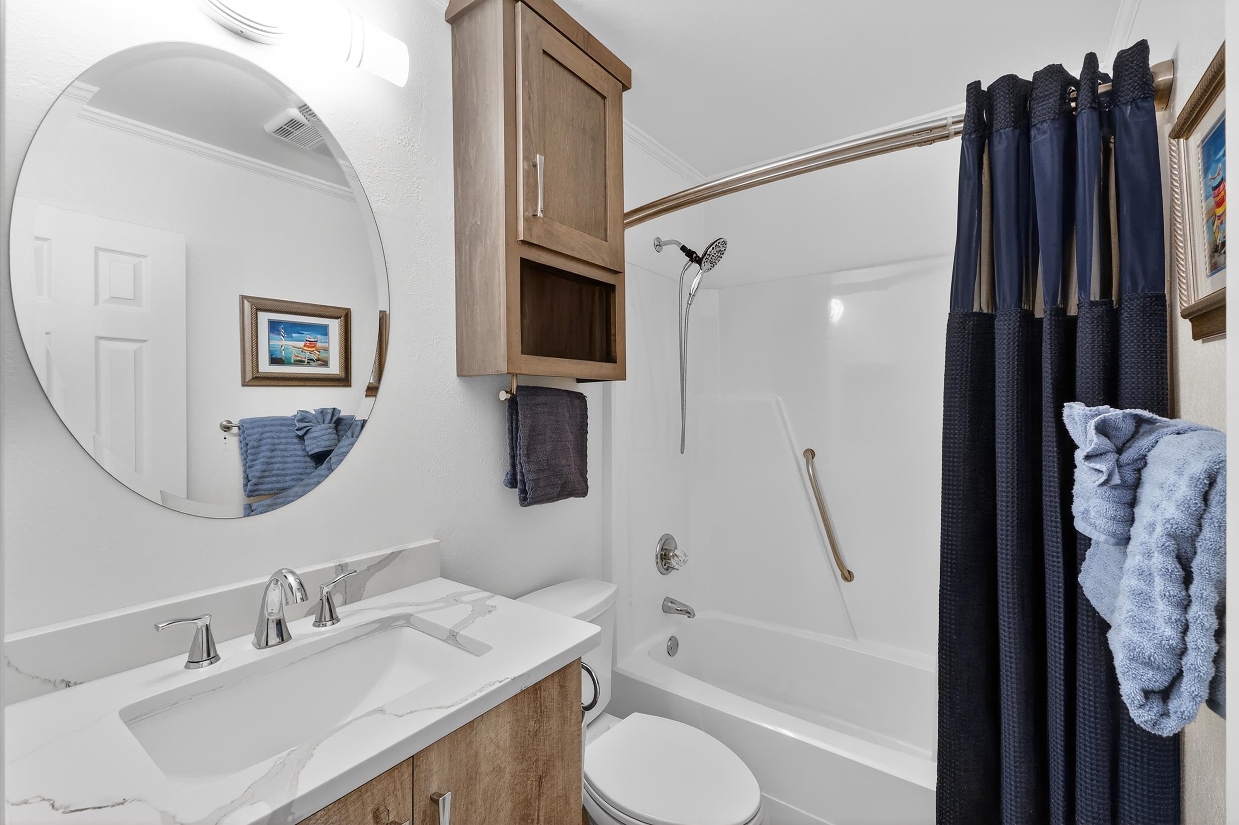 9581 Shore Drive, Unit 229 Myrtle Beach, SC 29572 - Photo 27 of 39 Full bath with shower / bath combination with curtain, vanity, and ornamental molding