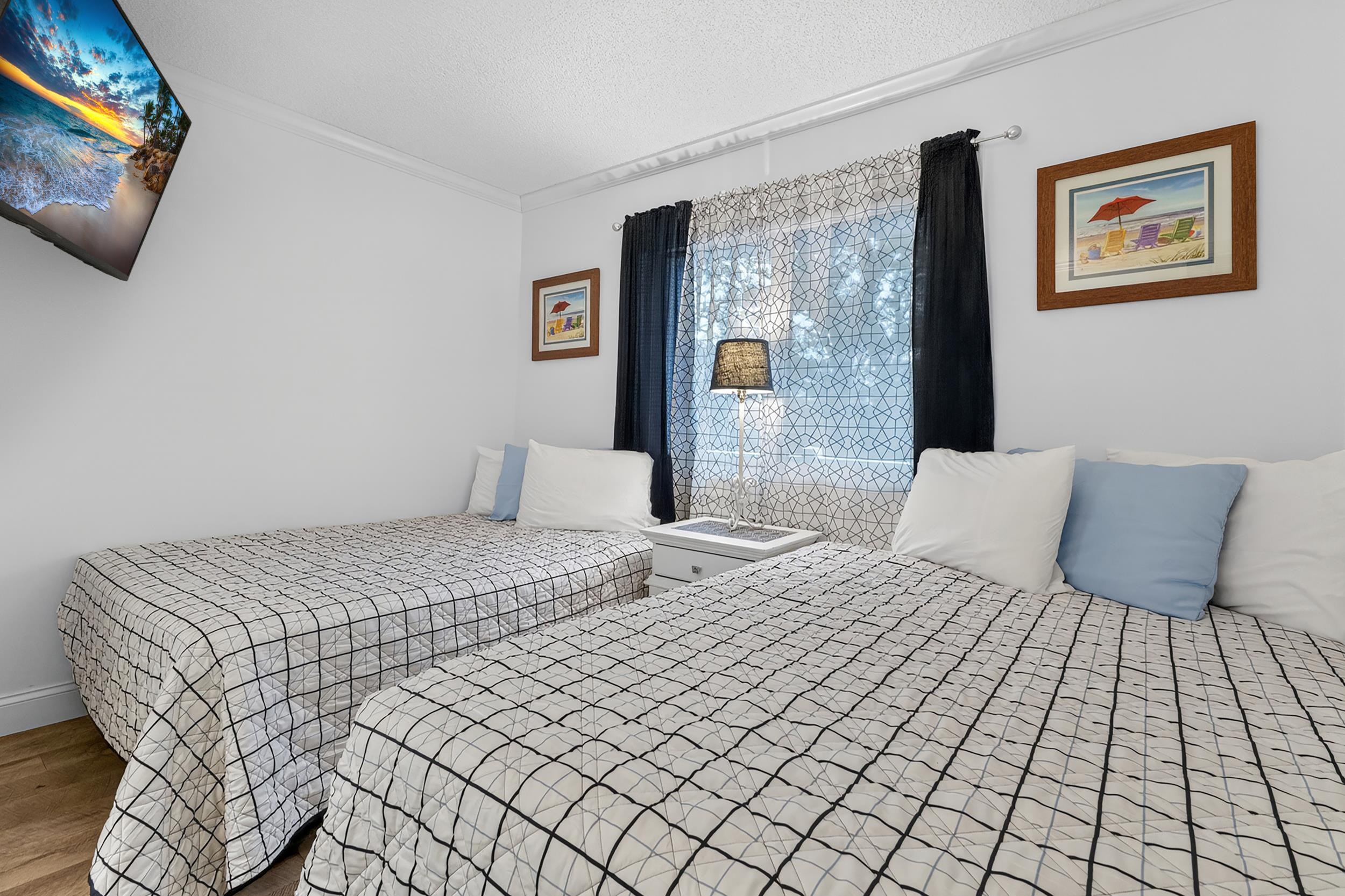9581 Shore Drive, Unit 229 Myrtle Beach, SC 29572 - Photo 28 of 39 Bedroom featuring ornamental molding, a textured ceiling, and wood finished floors