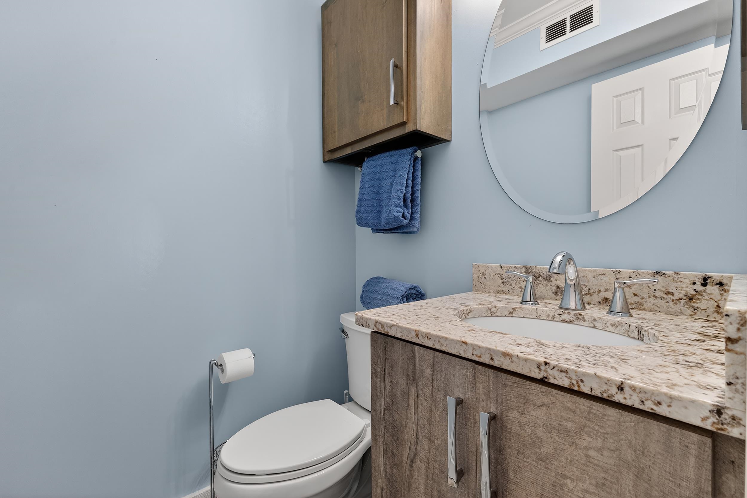 9581 Shore Drive, Unit 229 Myrtle Beach, SC 29572 - Photo 31 of 39 Half bath featuring vanity and toilet