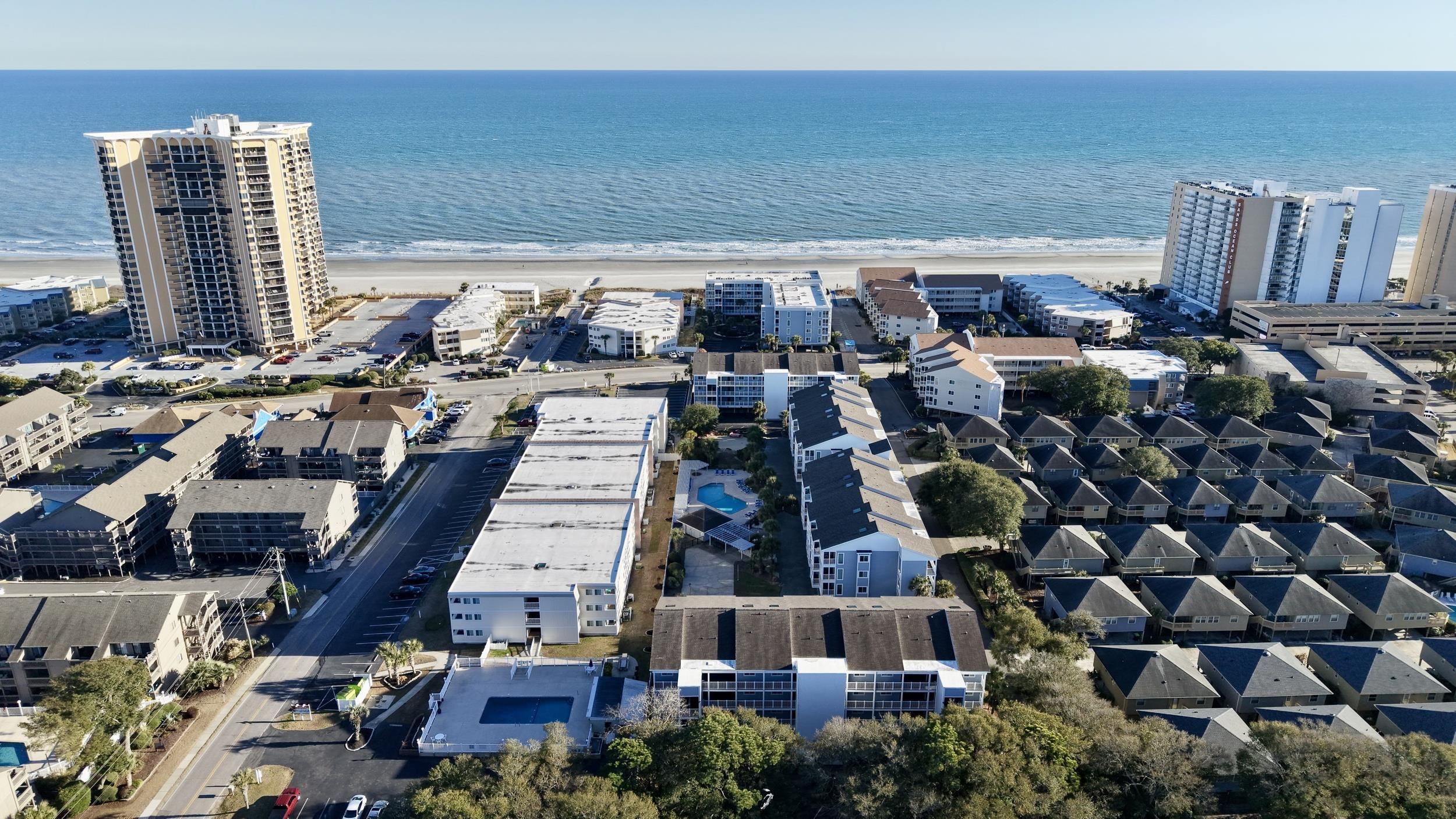 9581 Shore Drive, Unit 229 Myrtle Beach, SC 29572 - Photo 37 of 39 Aerial overview of property's location with waterfront with a beach