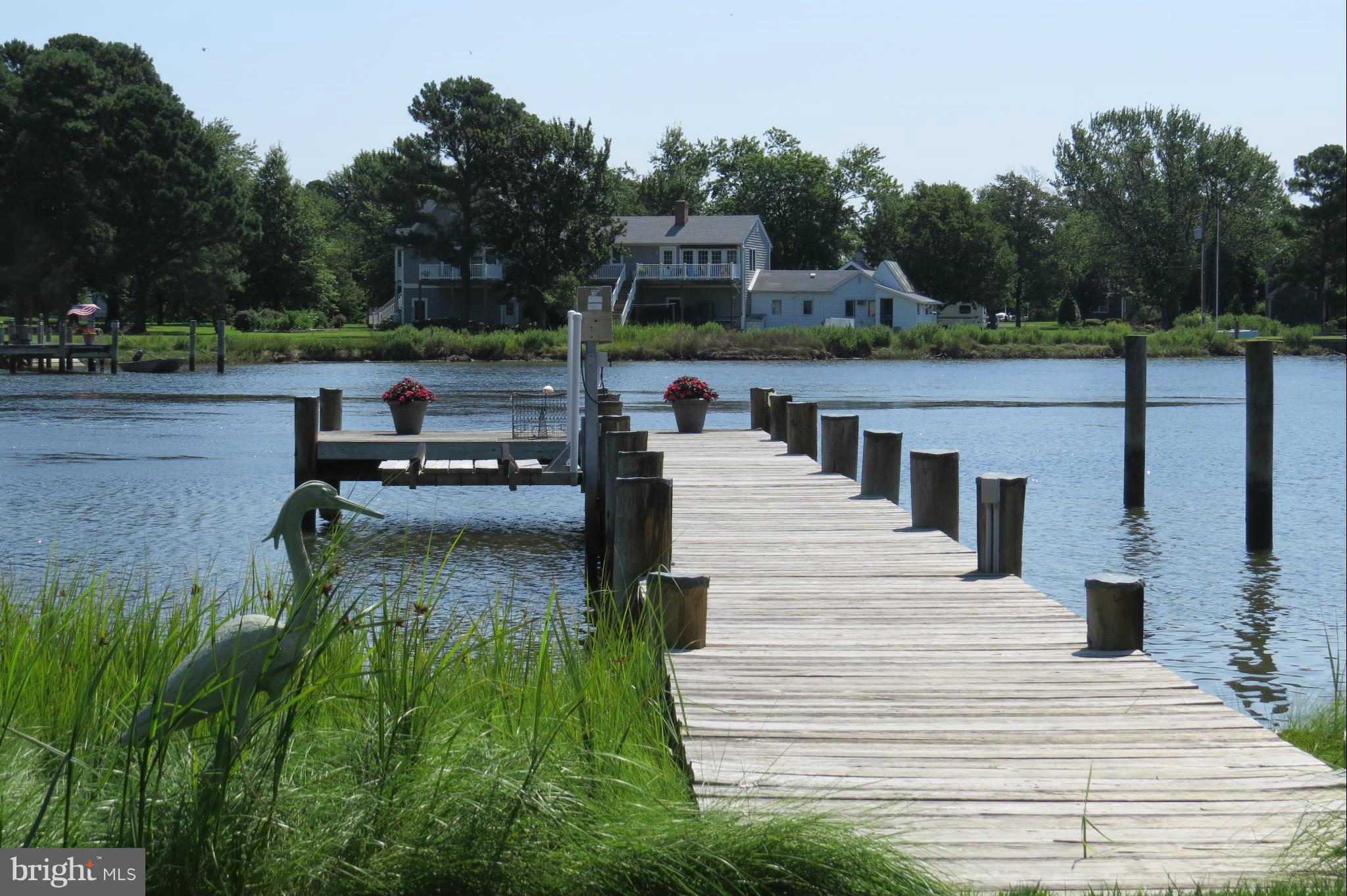 4889 Black Walnut Point Road Tilghman, MD 21671 - Photo 18 of 30 Pier with boat lift