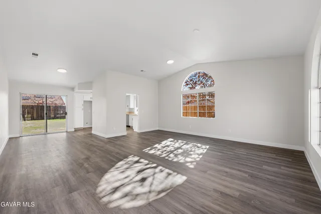 a view of an empty room and window