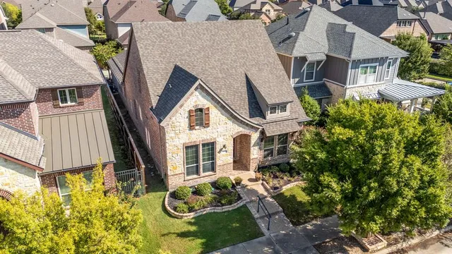 a aerial view of a house with entertaining space