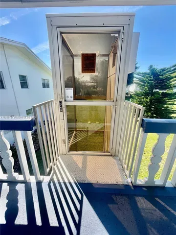 a view of front door and porch