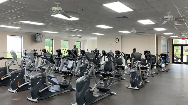 a large room with gym equipment