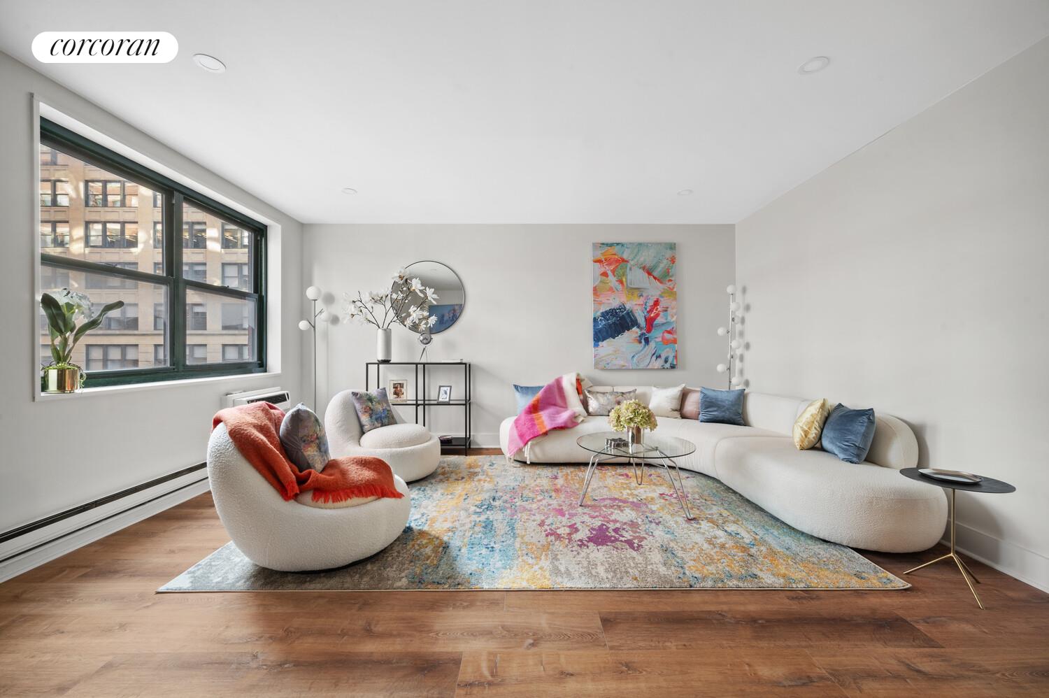 636 Washington Street, Unit 3B Manhattan, NY 10014 - Photo 2 of 9 a living room with furniture fireplace and window