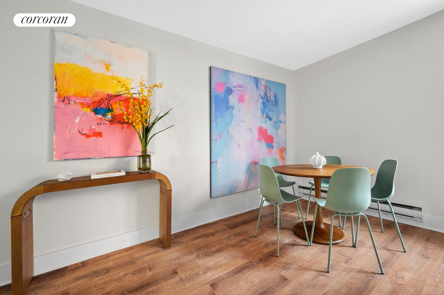 636 Washington Street, Unit 3B Manhattan, NY 10014 - Photo 3 of 9 a view of a dining room with furniture and wooden floor