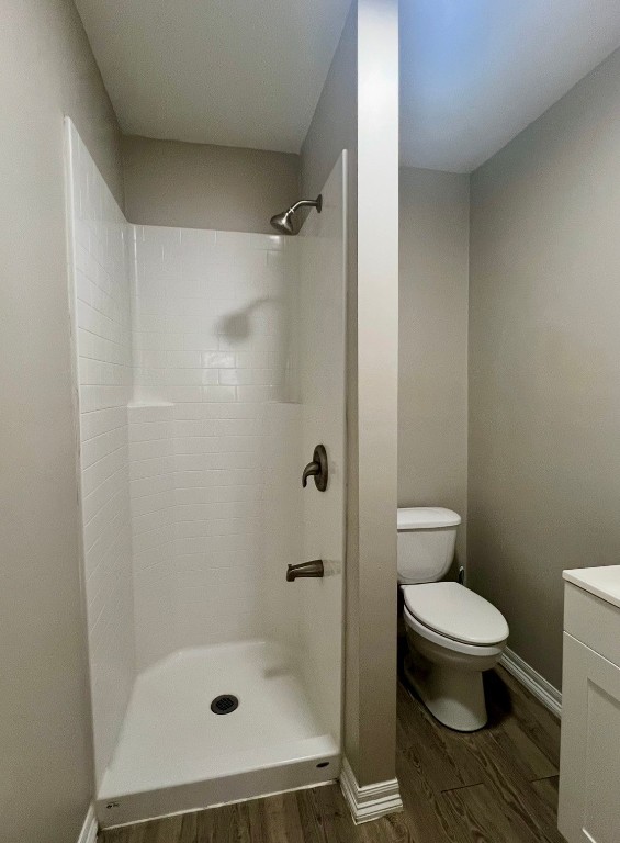 415 Randall Street Pasadena, TX 77506 - Photo 6 of 13 a bathroom with a toilet and a shower