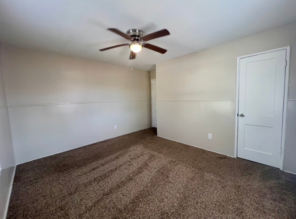 415 Randall Street Pasadena, TX 77506 - Photo 7 of 13 a view of a big room with carpet