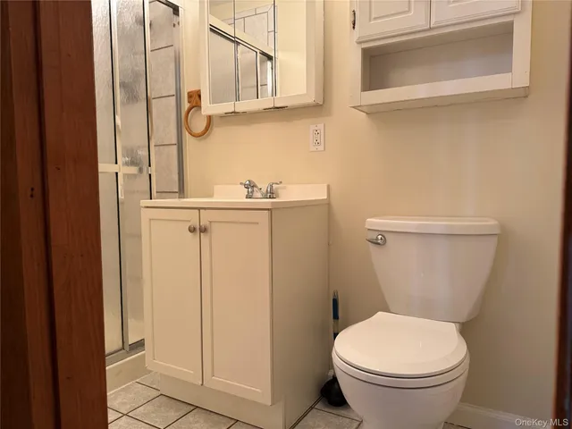 a bathroom with a toilet and a sink