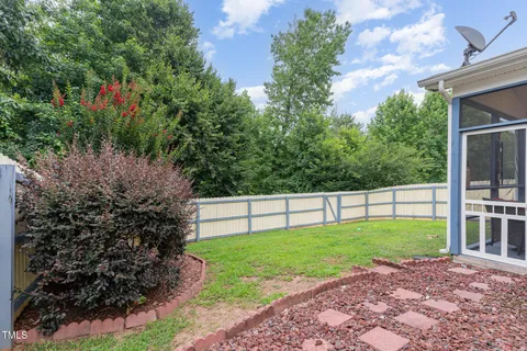 a view of a backyard with a garden