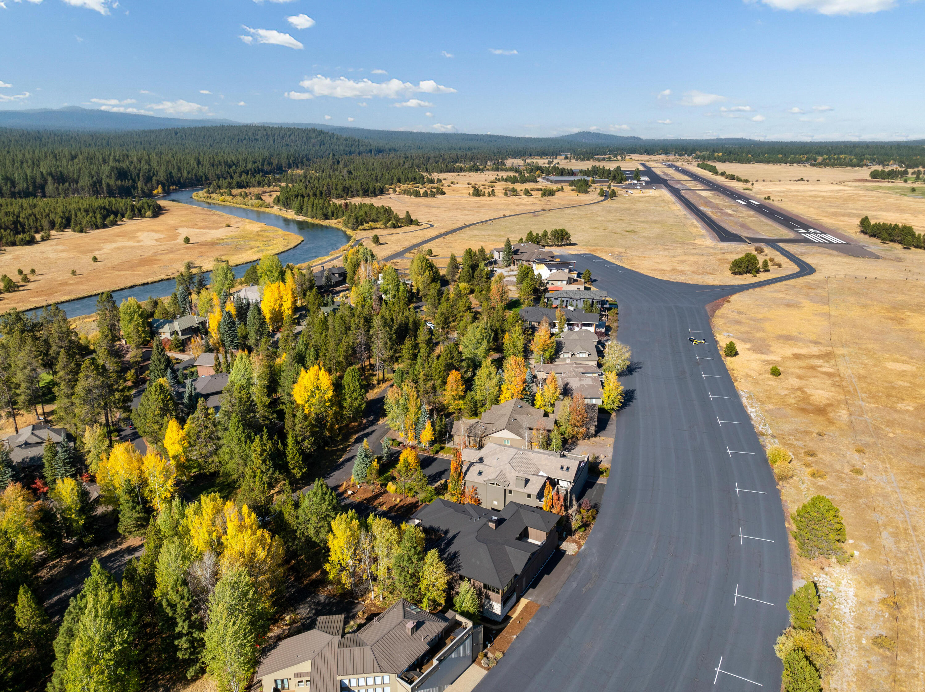 56878 River Road, Unit 2 Sunriver, OR 97707 - Photo 3 of 67 A rare opportunity to own a luxury residence w/ taxiway access from Sunriver Airport into your hangar.