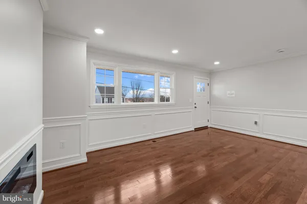 a large kitchen with stainless steel appliances lots of counter top space