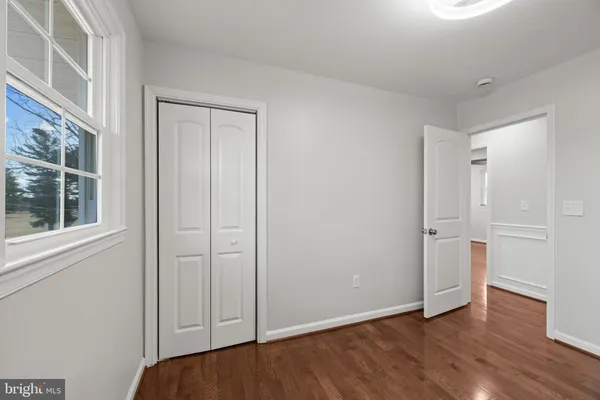 a view of entryway with wooden floor