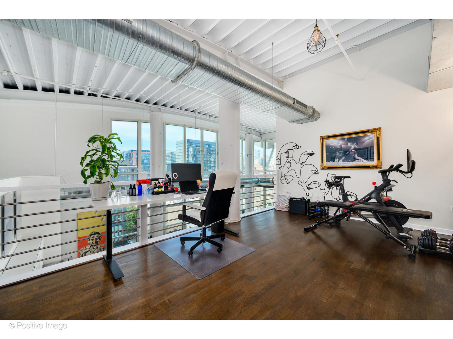 909 West Washington Boulevard, Unit 1012 Chicago, IL 60607 - Photo 14 of 30 a living room with furniture gym equipment and a chandelier