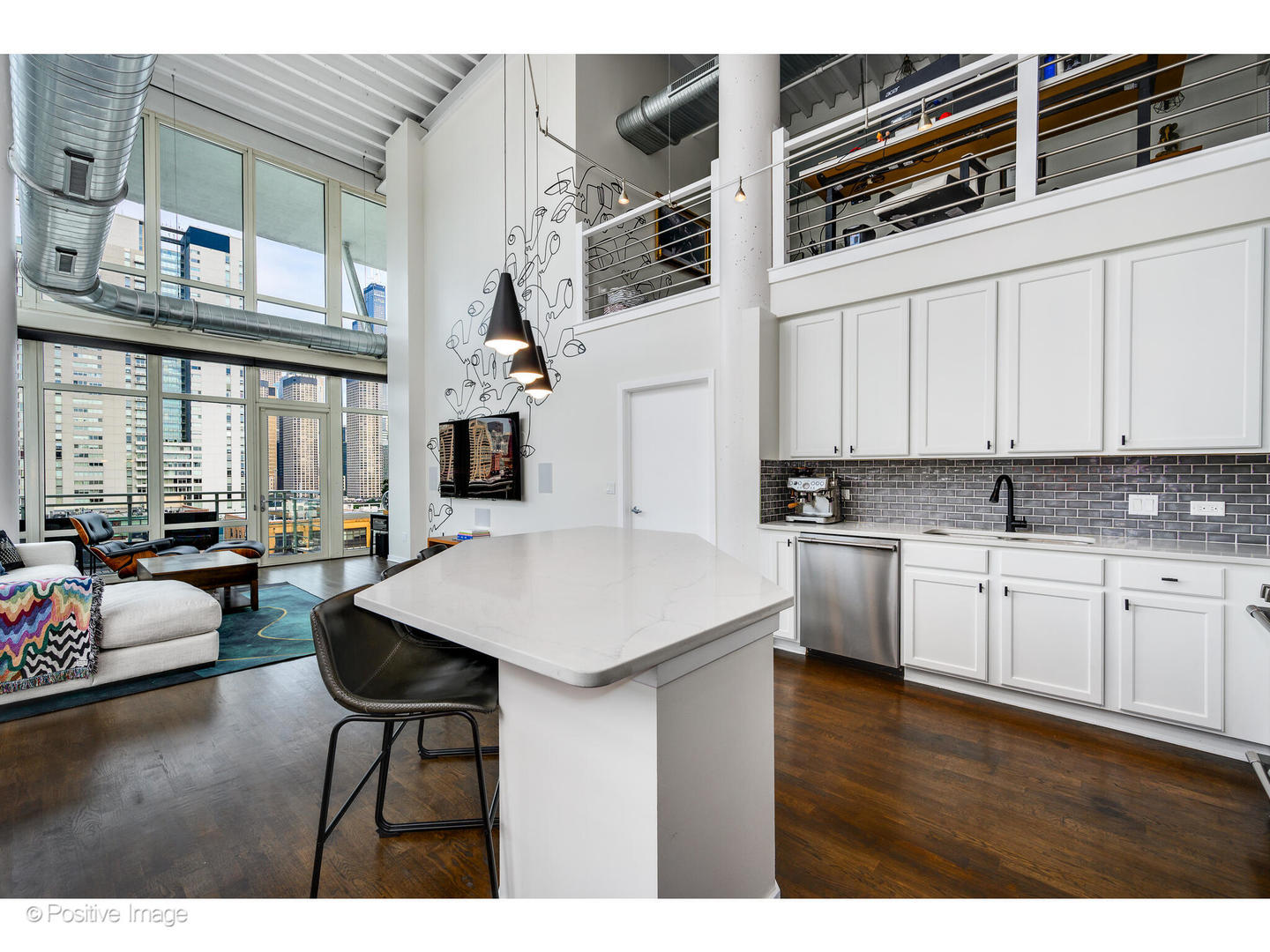 909 West Washington Boulevard, Unit 1012 Chicago, IL 60607 - Photo 2 of 30 a kitchen with stainless steel appliances granite countertop a stove and white cabinets