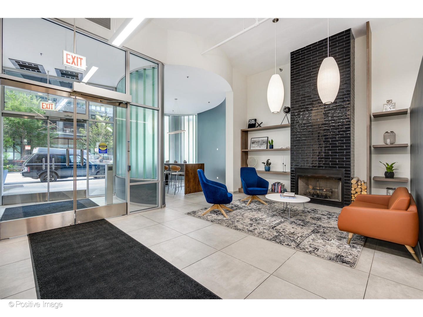 909 West Washington Boulevard, Unit 1012 Chicago, IL 60607 - Photo 29 of 30 a living room with furniture a fireplace and a large window