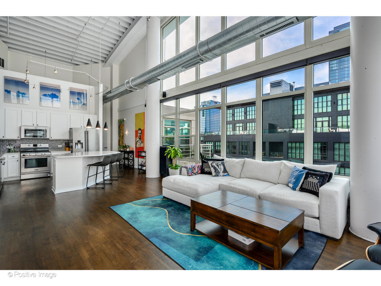 909 West Washington Boulevard, Unit 1012 Chicago, IL 60607 - Photo 6 of 30 a living room with furniture and a large window