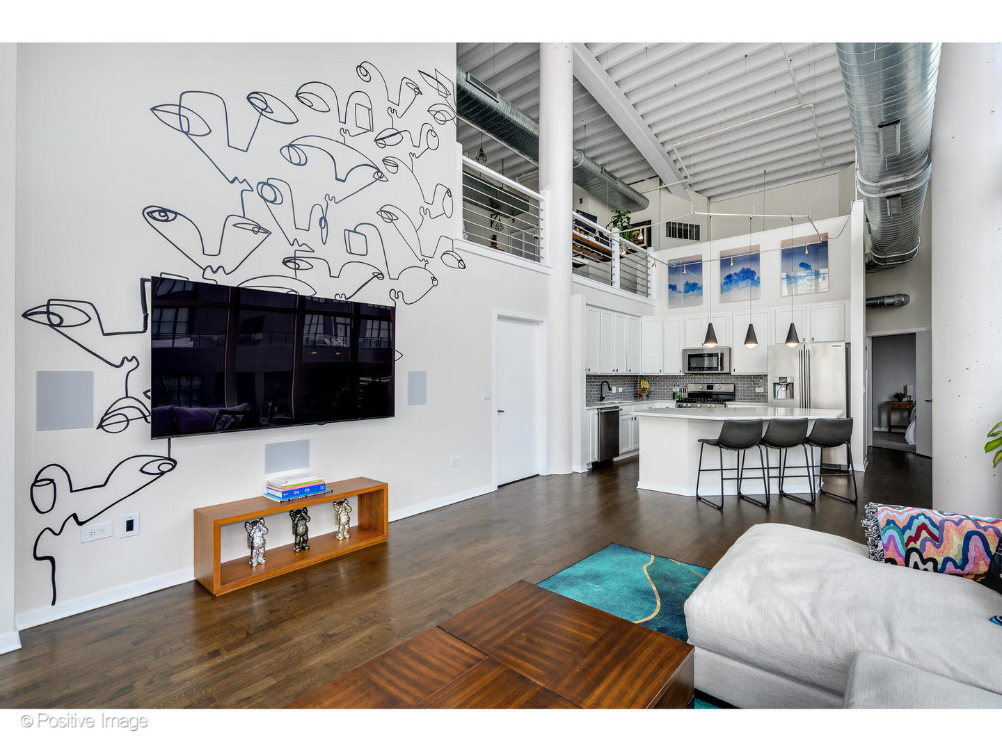 909 West Washington Boulevard, Unit 1012 Chicago, IL 60607 - Photo 7 of 30 a living room with furniture and a flat screen tv