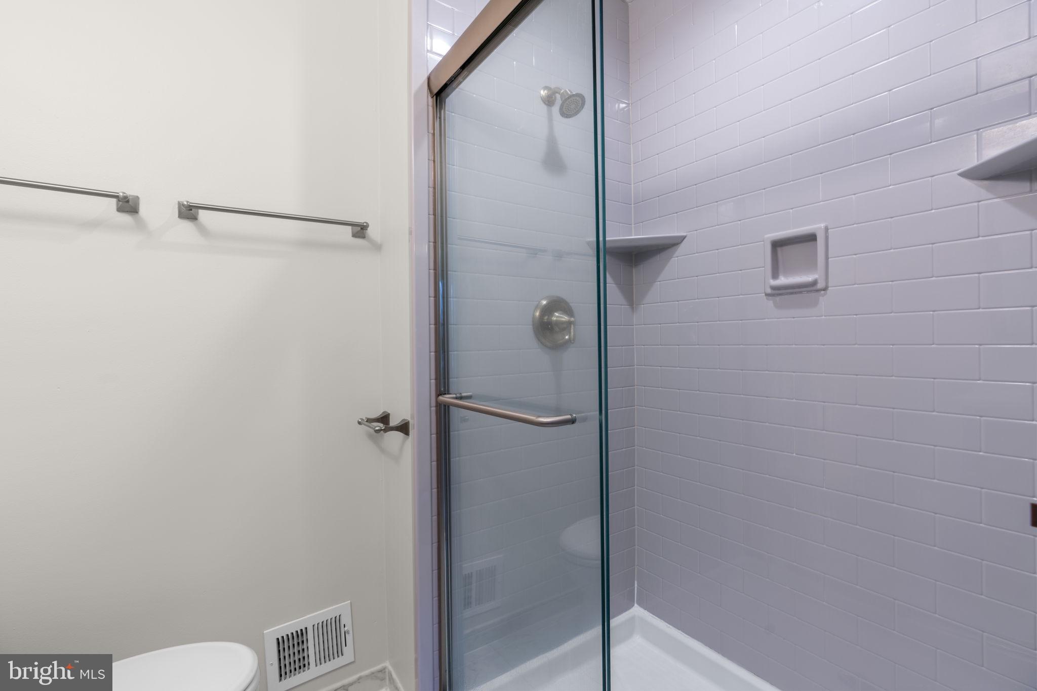 7818 Metacomet Road Hanover, MD 21076 - Photo 22 of 52 a bathroom with a shower