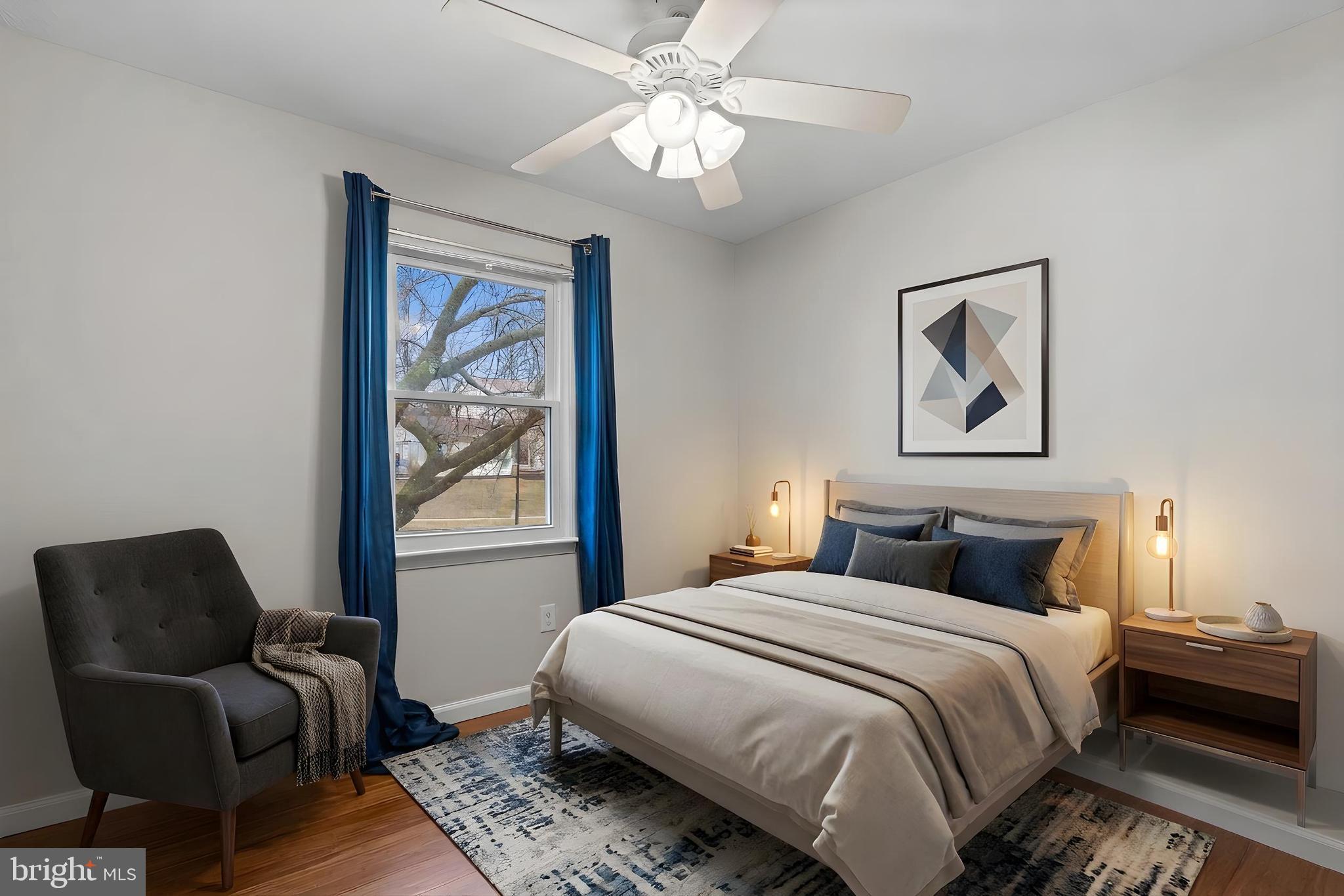 7818 Metacomet Road Hanover, MD 21076 - Photo 23 of 52 a bedroom with a bed and wooden floor