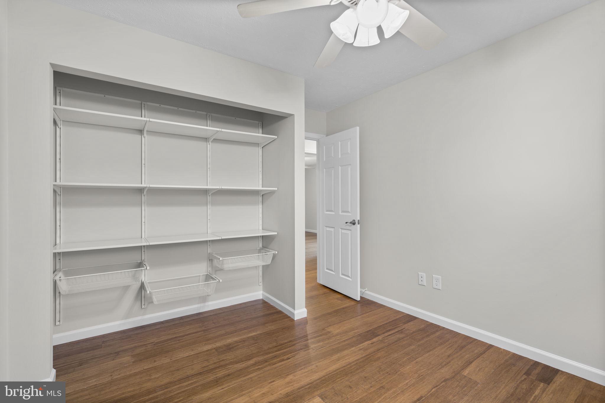 7818 Metacomet Road Hanover, MD 21076 - Photo 25 of 52 a view of a room with wooden floor and a window