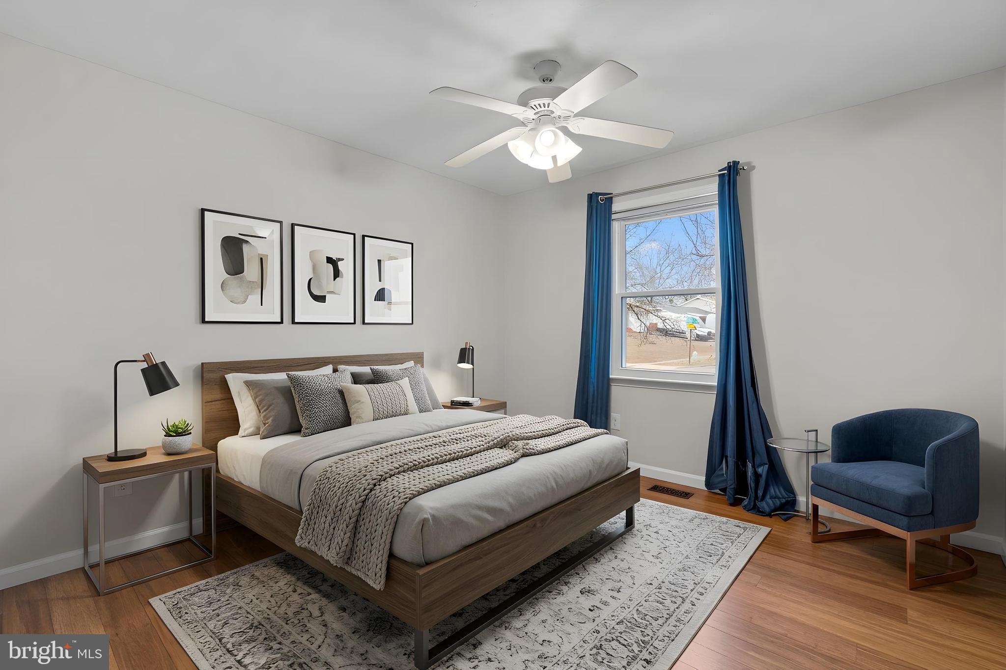 7818 Metacomet Road Hanover, MD 21076 - Photo 27 of 52 a bedroom with a bed and a chair