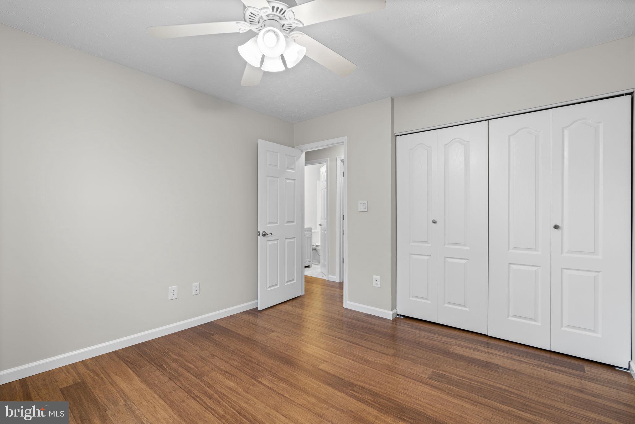 7818 Metacomet Road Hanover, MD 21076 - Photo 29 of 52 a view of an empty room with wooden floor