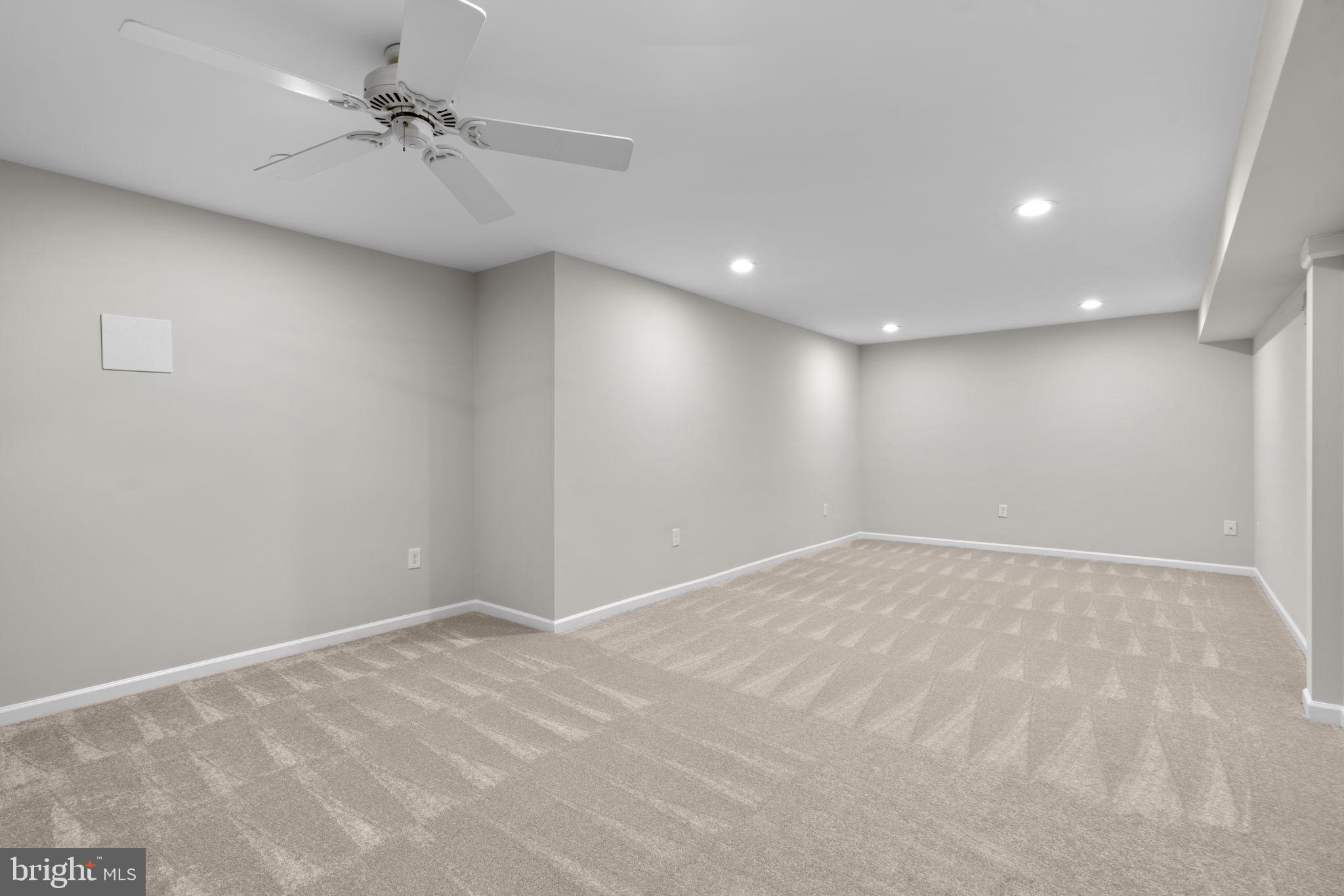 7818 Metacomet Road Hanover, MD 21076 - Photo 31 of 52 a view of an empty room with a ceiling fan