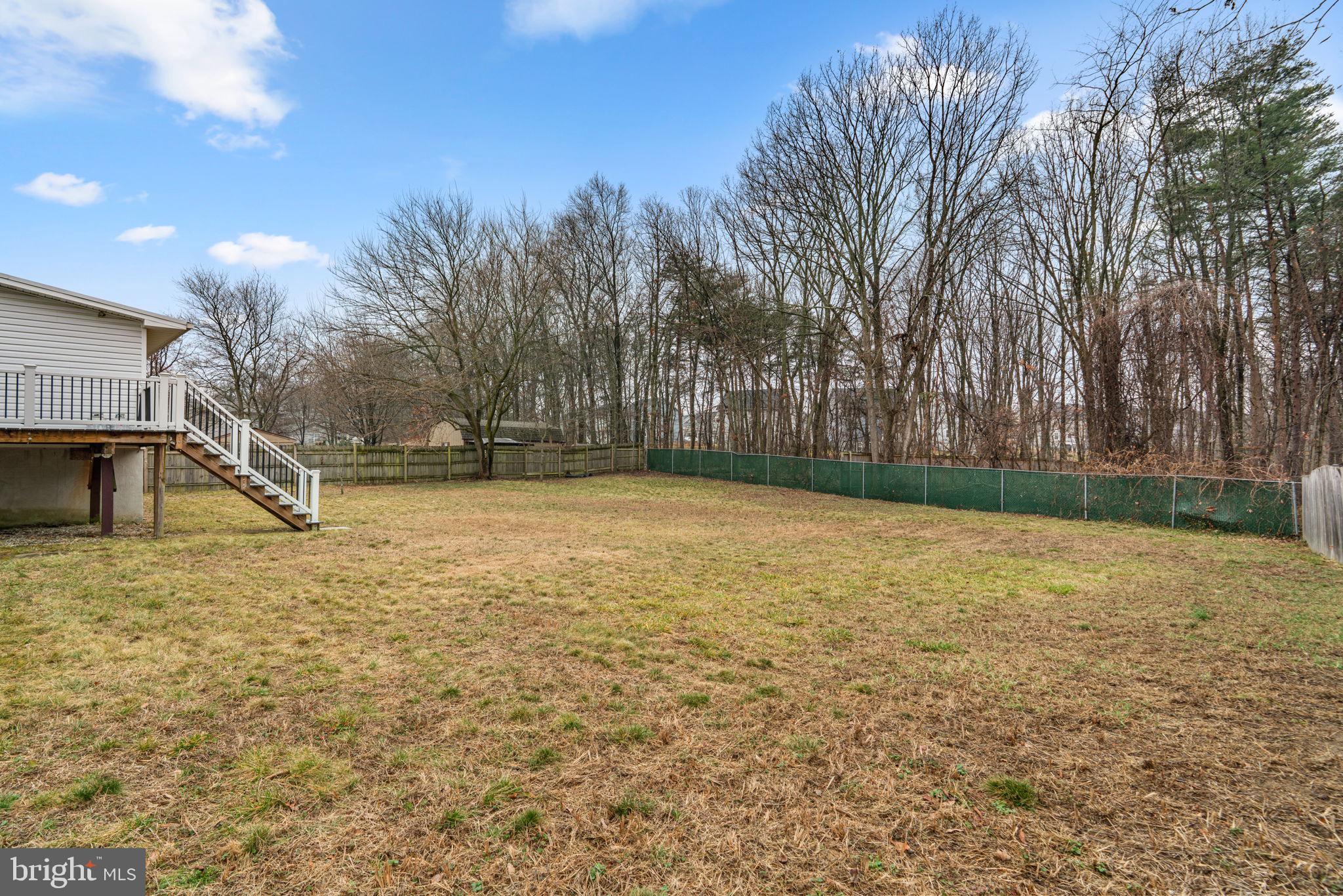7818 Metacomet Road Hanover, MD 21076 - Photo 48 of 52 a view of a yard with a trees
