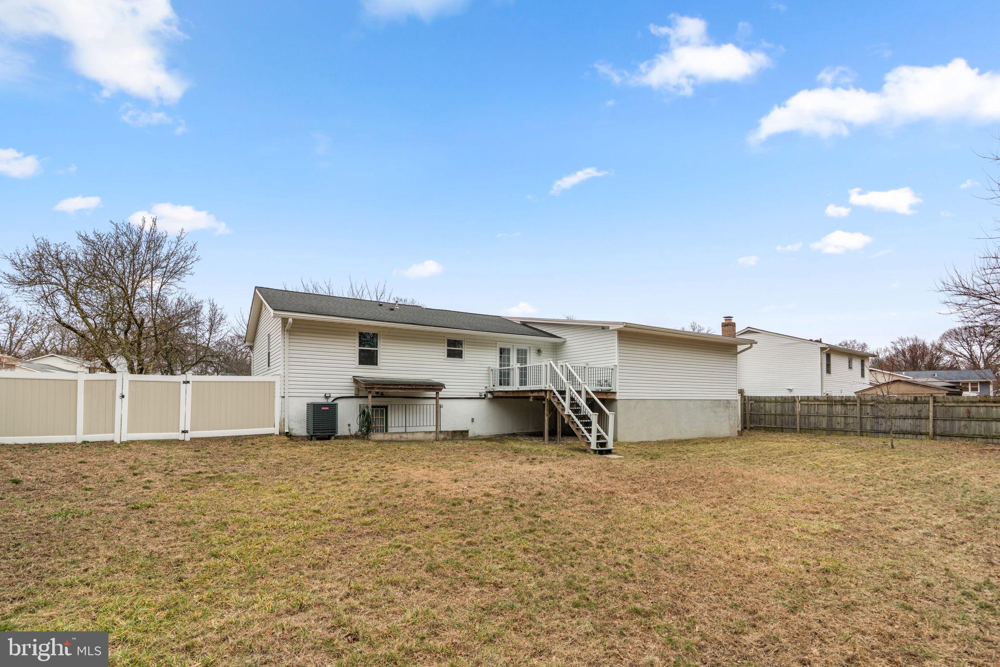 7818 Metacomet Road Hanover, MD 21076 - Photo 49 of 52 a view of a house with a yard