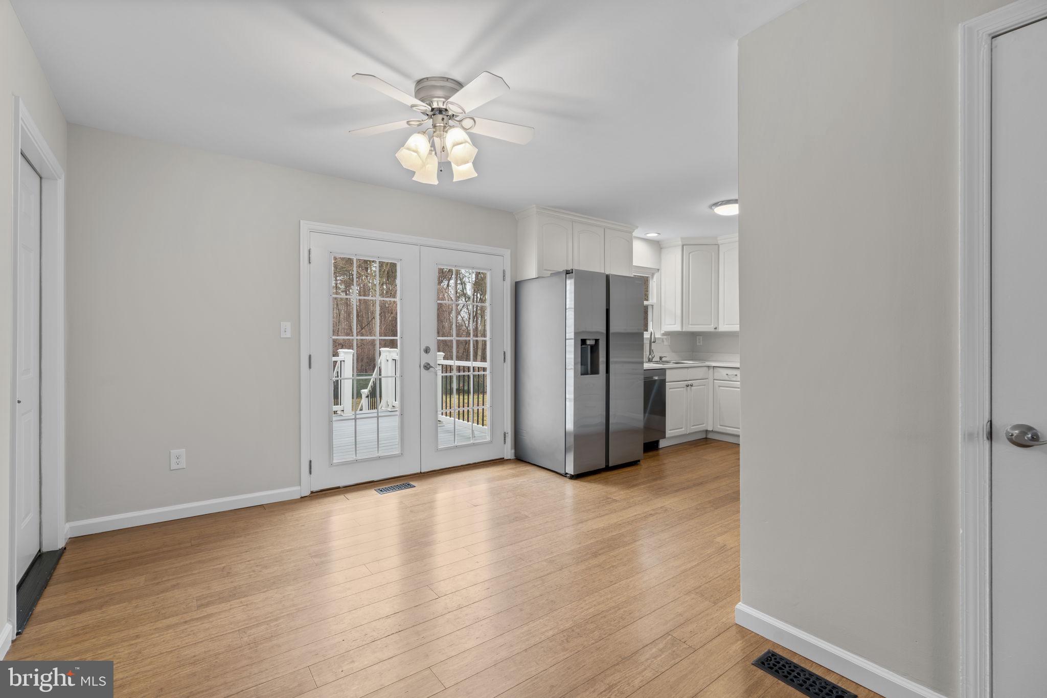 7818 Metacomet Road Hanover, MD 21076 - Photo 10 of 52 a view of an empty room with a window