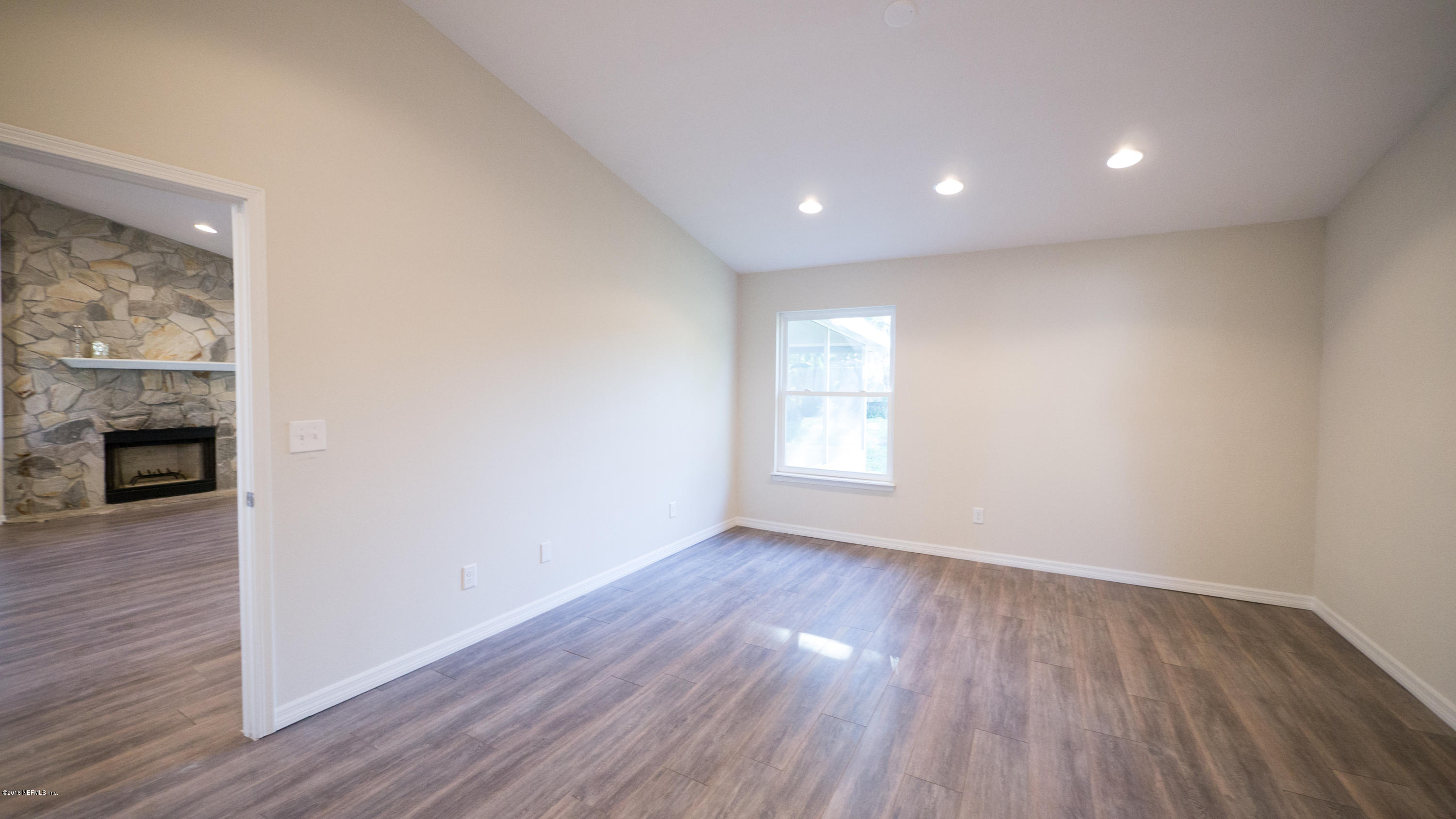 944 Aries Road West Jacksonville, FL 32216 - Photo 23 of 47 Master to Living Room View