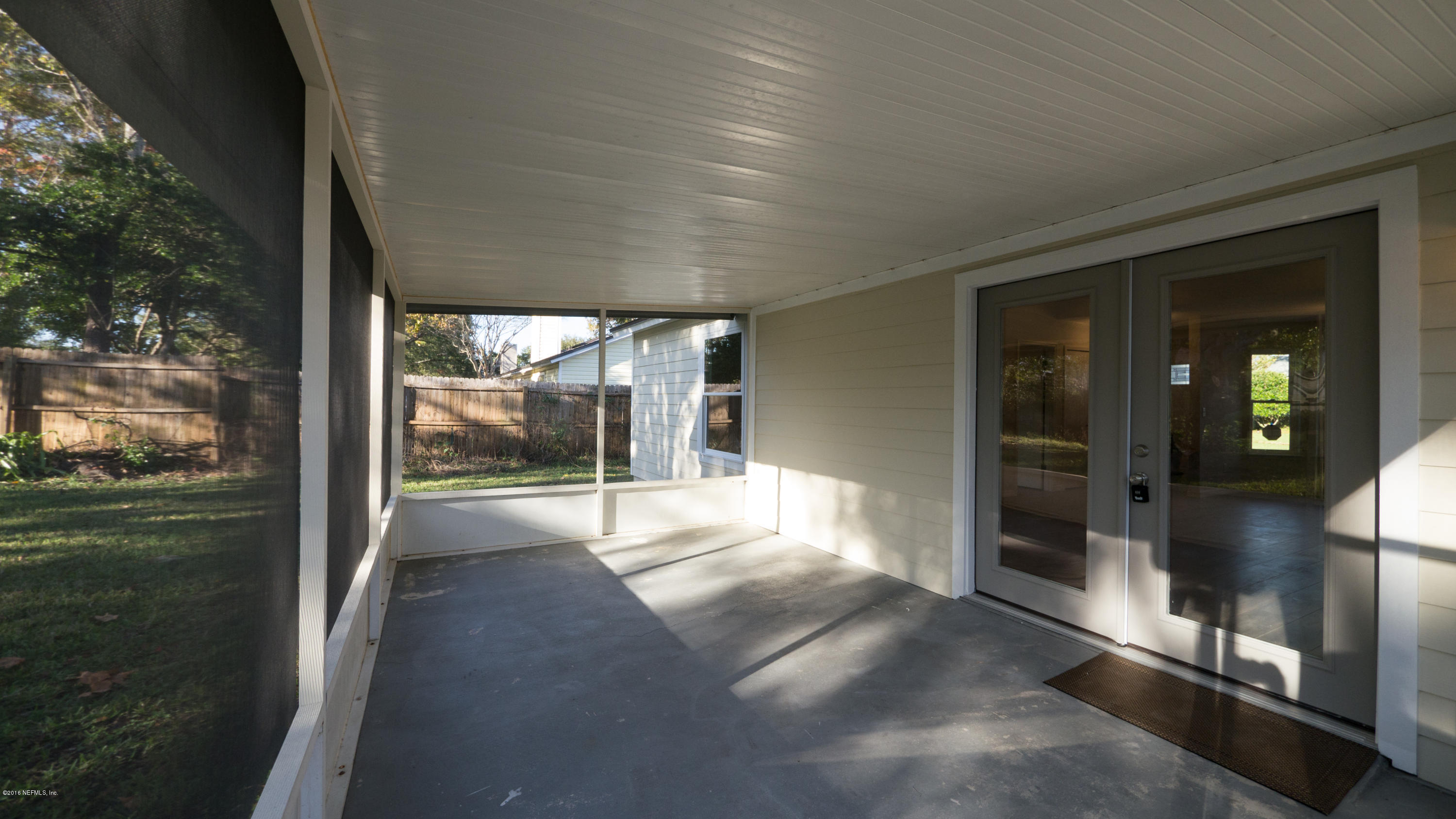 944 Aries Road West Jacksonville, FL 32216 - Photo 45 of 47 Screened Patio (2)