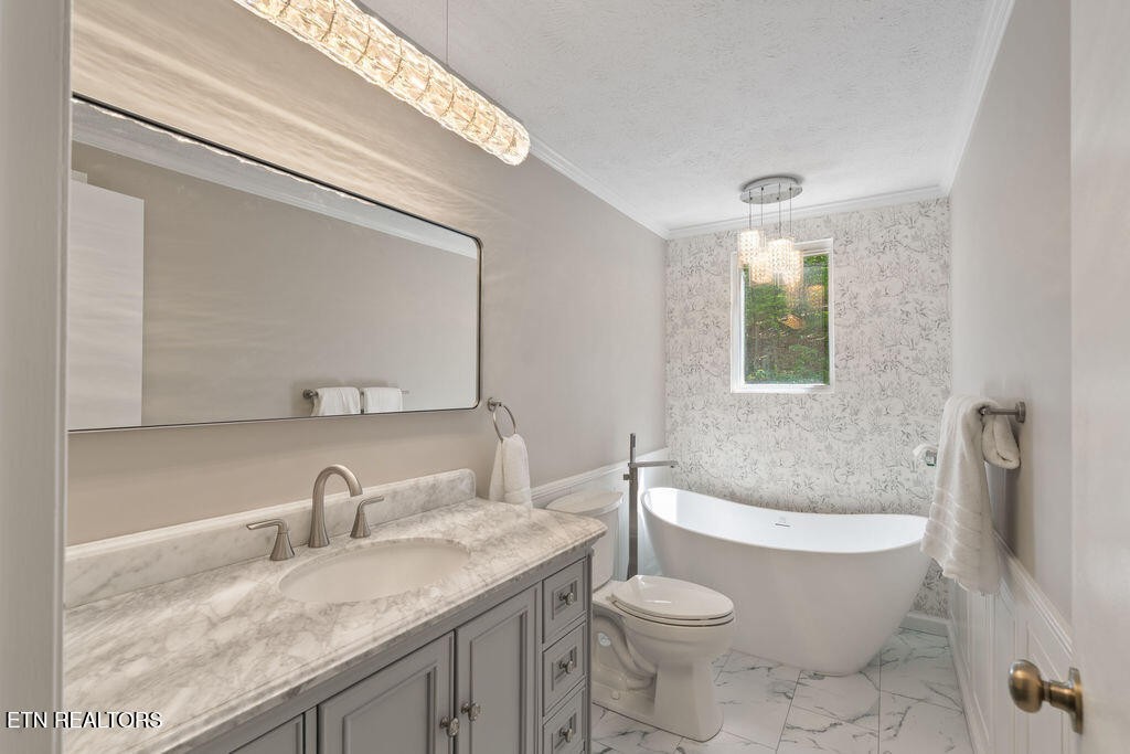 8908 Ellis Lane Powell, TN 37849 - Photo 17 of 37 a bathroom with a granite countertop sink and a mirror