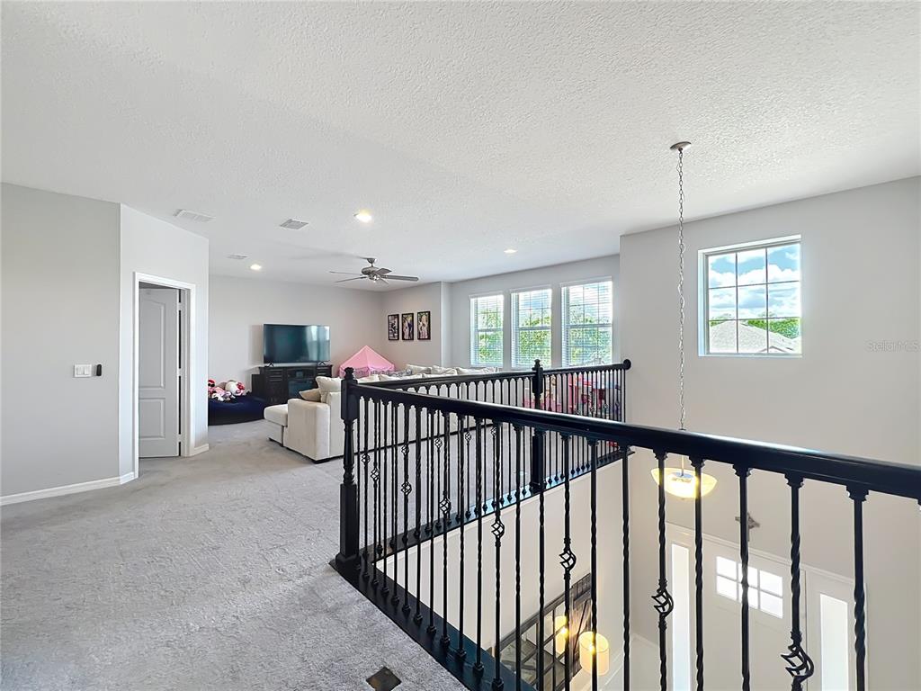 2676 Estuary Loop Oviedo, FL 32765 - Photo 42 of 92 a view of livingroom with furniture and windows