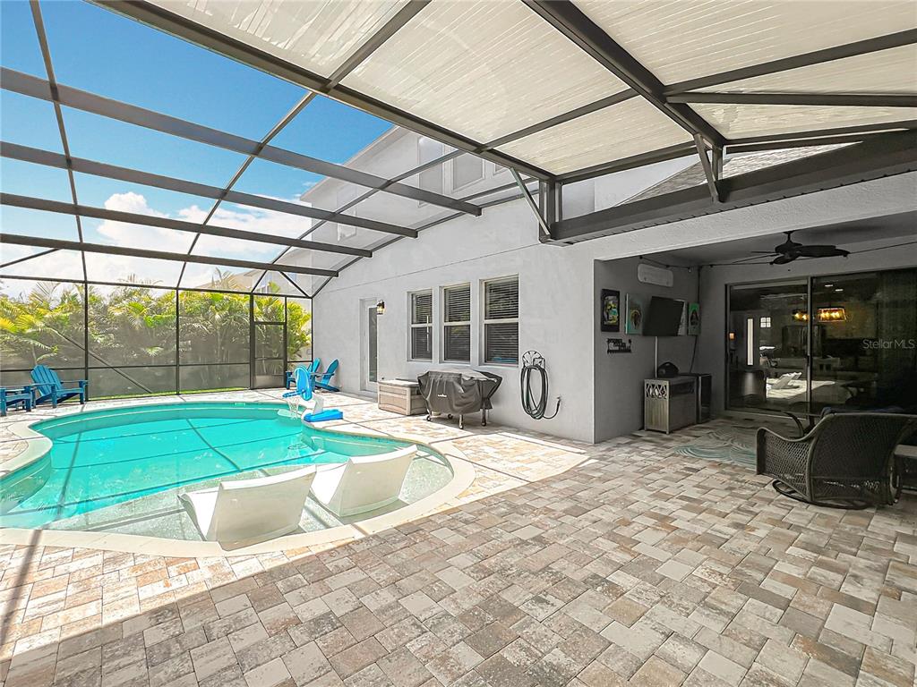 2676 Estuary Loop Oviedo, FL 32765 - Photo 72 of 92 a view of a house with backyard porch and sitting area