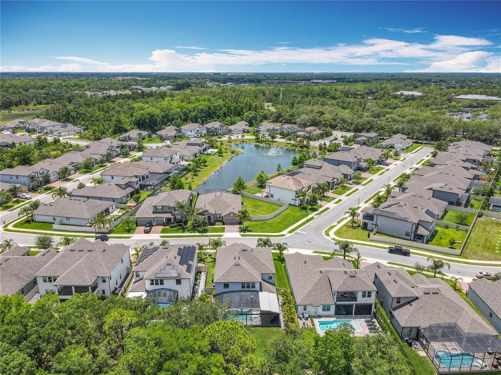 2676 Estuary Loop Oviedo, FL 32765 - Photo 88 of 92 an aerial view of residential houses with outdoor space and river