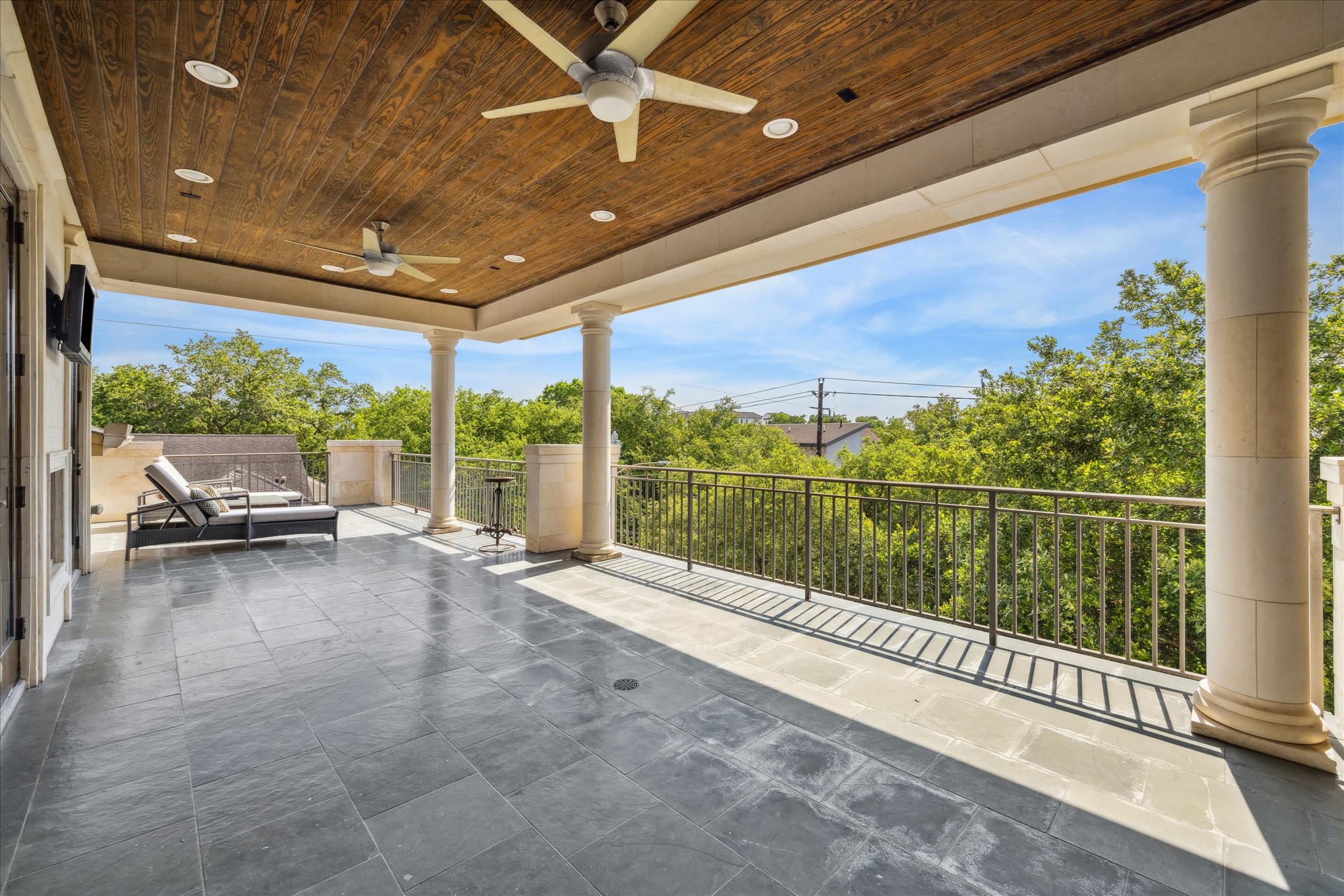 2247 Bartlett Street Houston, TX 77098 - Photo 48 of 50 Another view of the third floor TERRACE with tree top views overlooking the side yard.