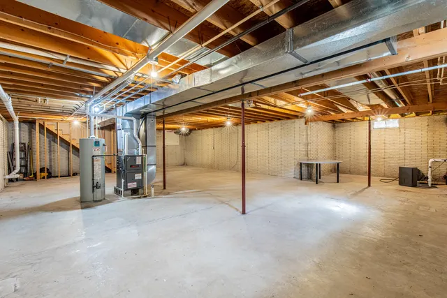 a view of a room with wooden walls