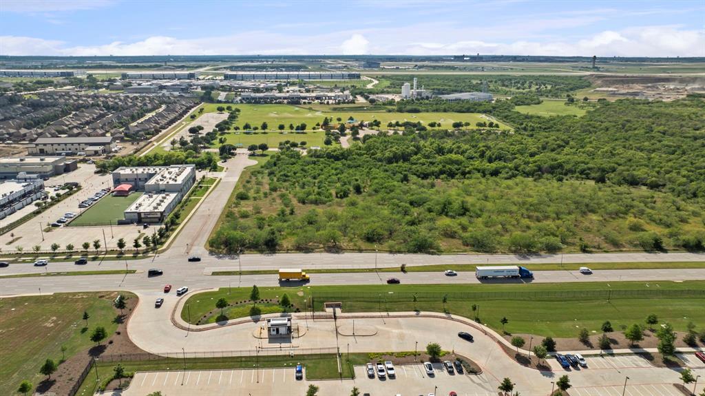 5200 North Belt Line Road Irving, TX 75038 - Photo 14 of 40 a view of a swimming pool with a yard