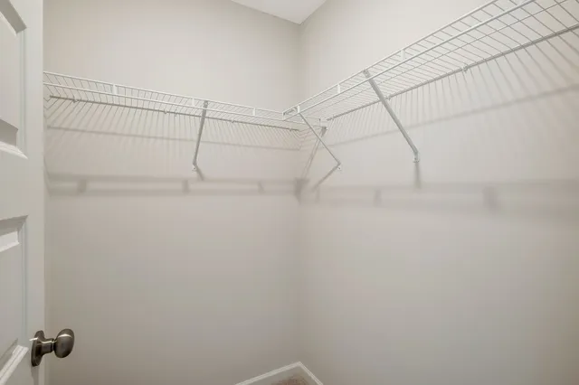 a bathroom with a toilet and a bathtub