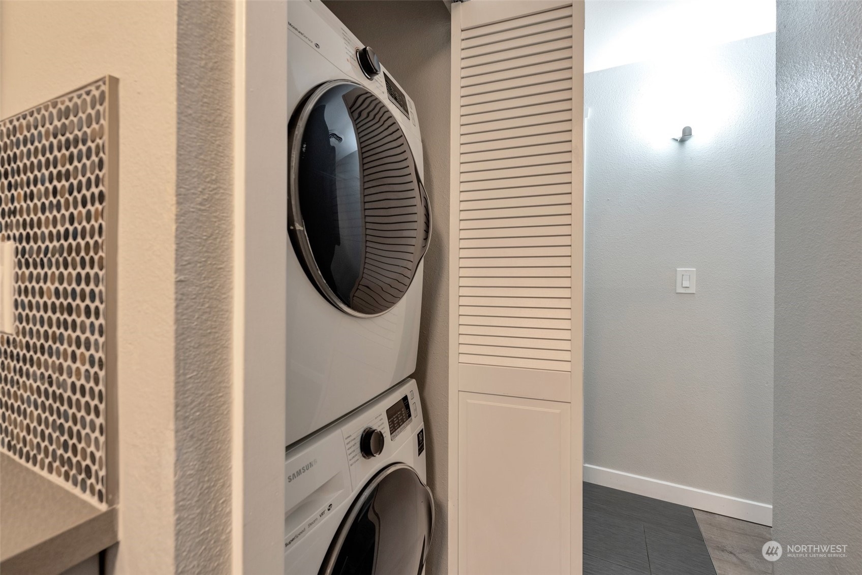 12119 Bel-Red Road, Unit B203 Bellevue, WA 98005 - Photo 12 of 15 a utility room with dryer and washer