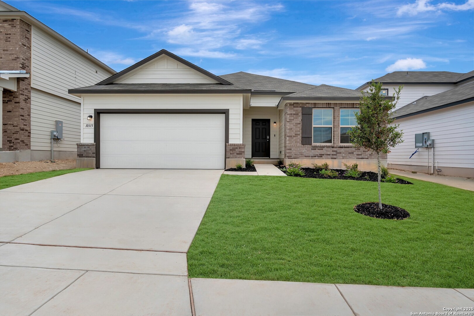 a front view of house with yard