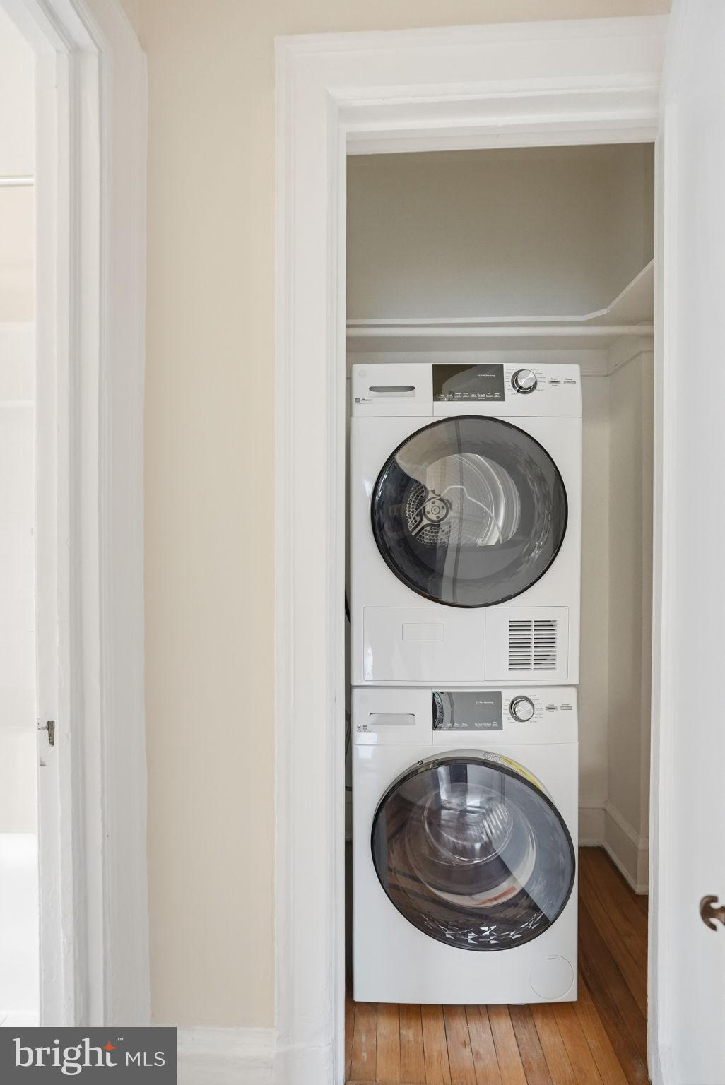 1613 Harvard Street Northwest, Unit 501 Washington, DC 20009 - Photo 16 of 25 Efficient laundry space in a cozy nook.