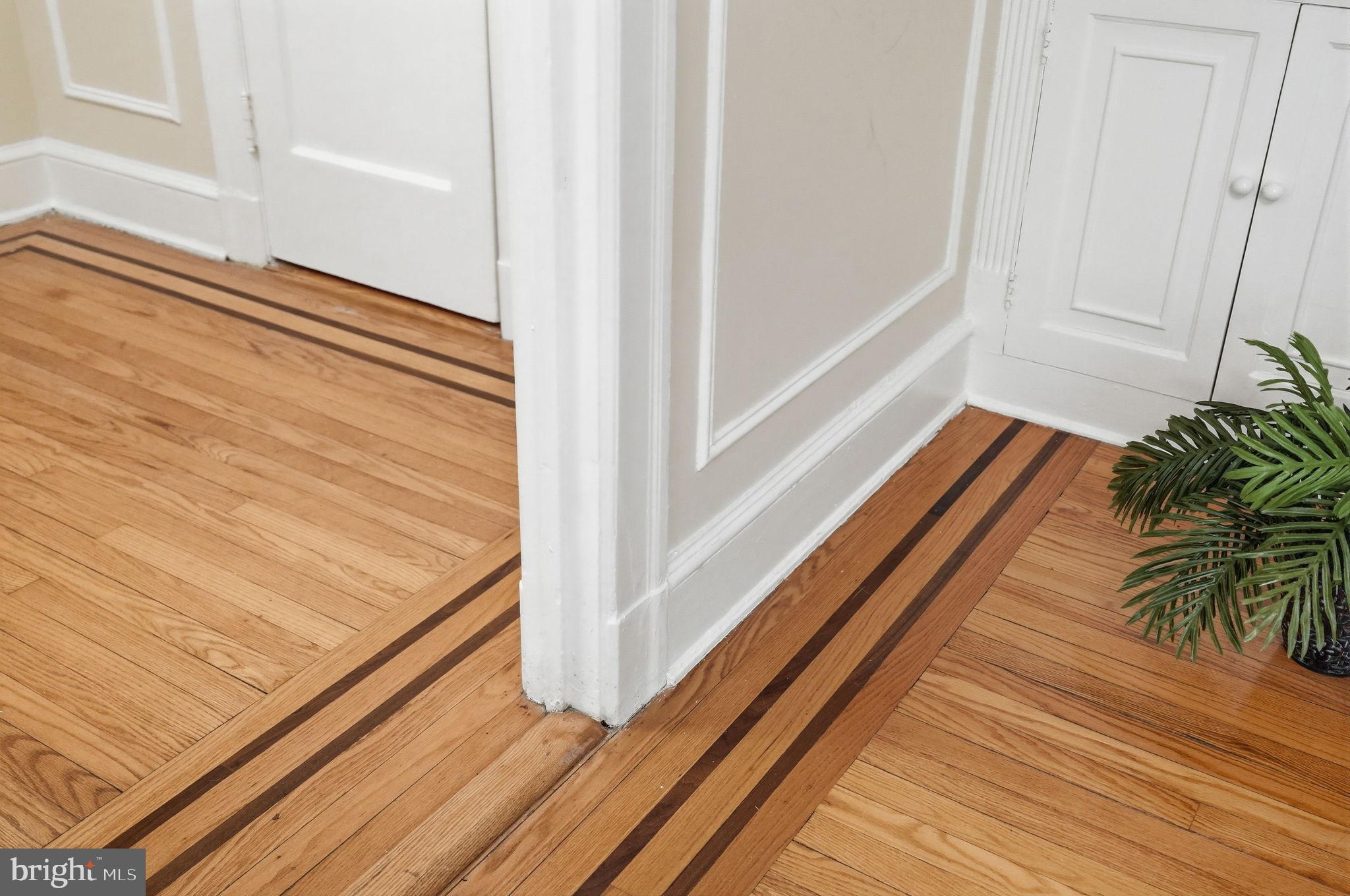 1613 Harvard Street Northwest, Unit 501 Washington, DC 20009 - Photo 17 of 25 Elegant wood flooring with stylish inlays.